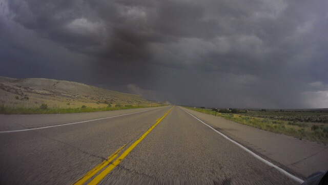 Riding into a storm near Granger, WY.