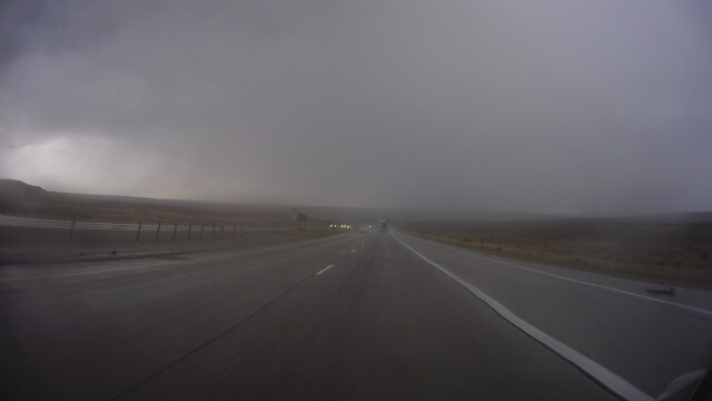 Riding through a rain storm on I-80 between Little America, WY and Green River, WY.