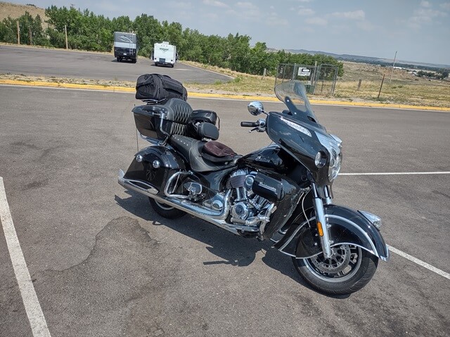 My motorcycle parked at a rest stop near Orin, WY.