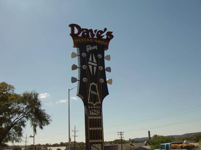 The sign for Dave's Guitar Shop.