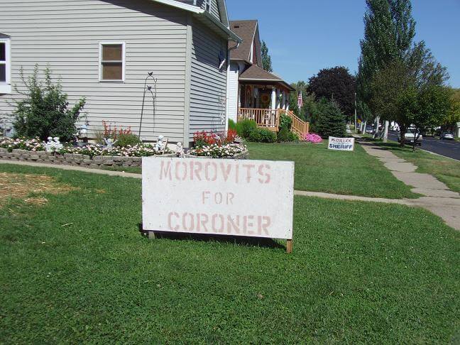 Apparently coroners have to campaign too.
