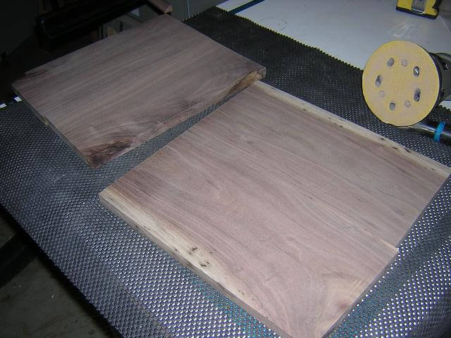 Sanding the top layer boards after glue up.