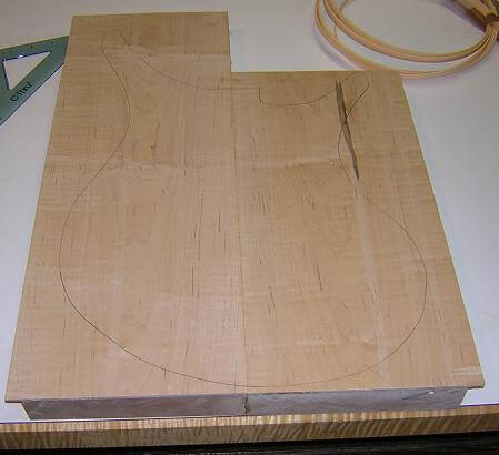 The outline of the template is traced onto the body blank.
