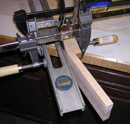 Gluing the scarf joint on the headstock.