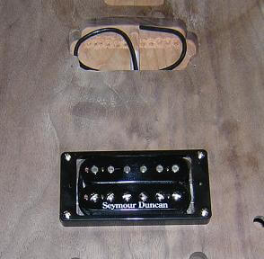 Drilling the holes for the bridge pickup.