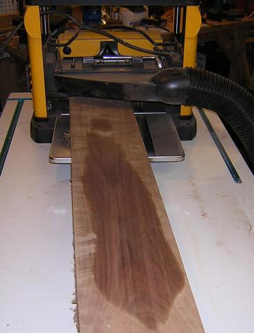 Running the plank through the planer.