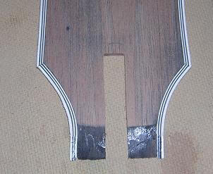 Access channel cut in the headstock plate for the truss rod.