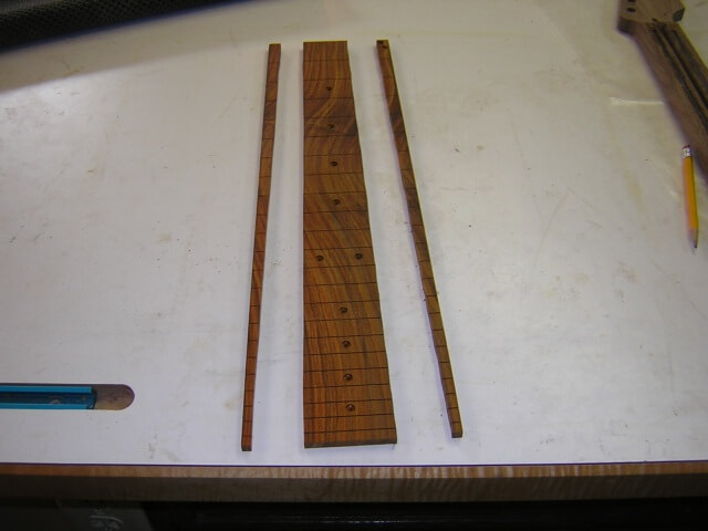 Rough tapering the fretboard.