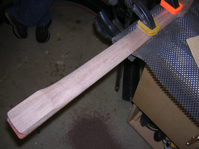 Carving the heel portion of the neck.