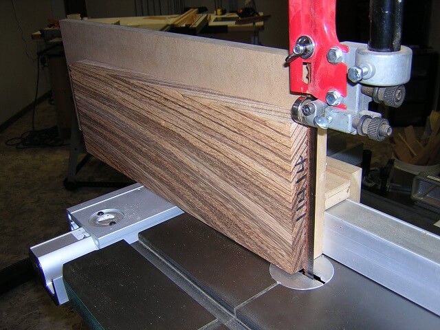 Cutting the board in half to create bookmatched pieces.