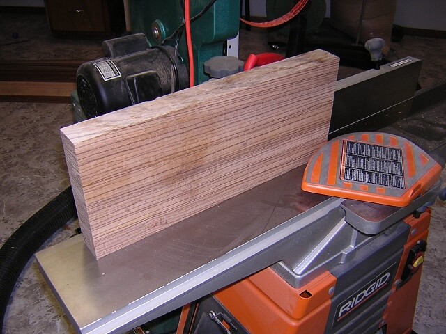 Jointing the edge before resawing.