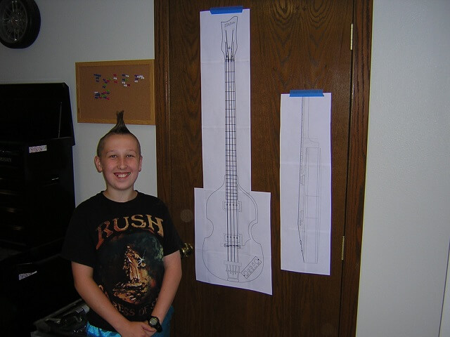 Tundra Boy posing with the plans for his bass.