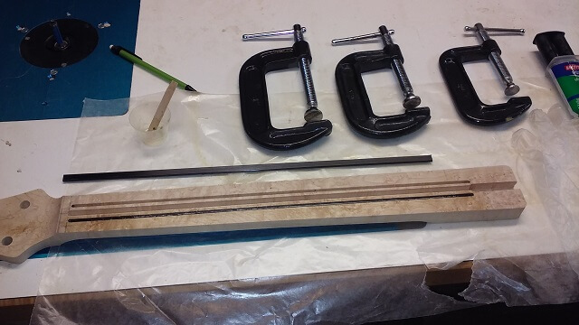 Gluing the carbon fiber rods in place.