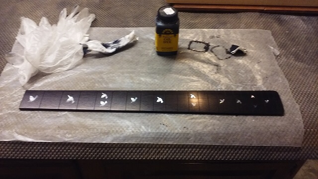 Dying the fretboard black.