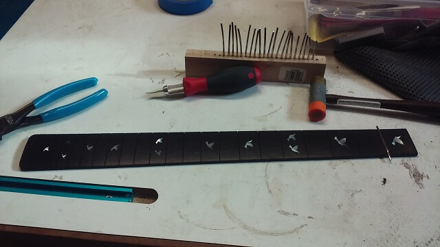 Getting ready to install the fret wire.