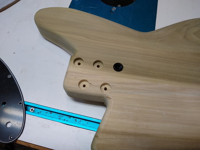 Creating the recessed holes for the neck ferrules.