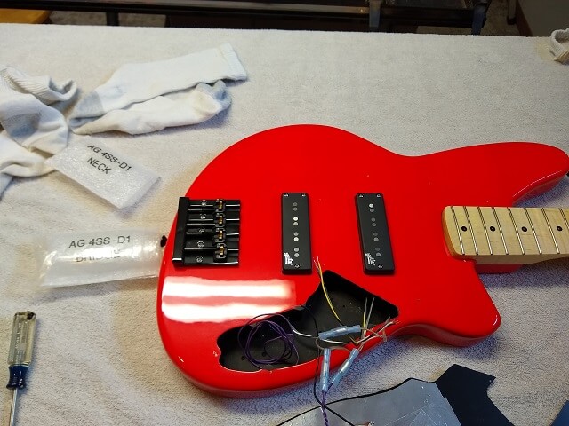 Installing the pickups.