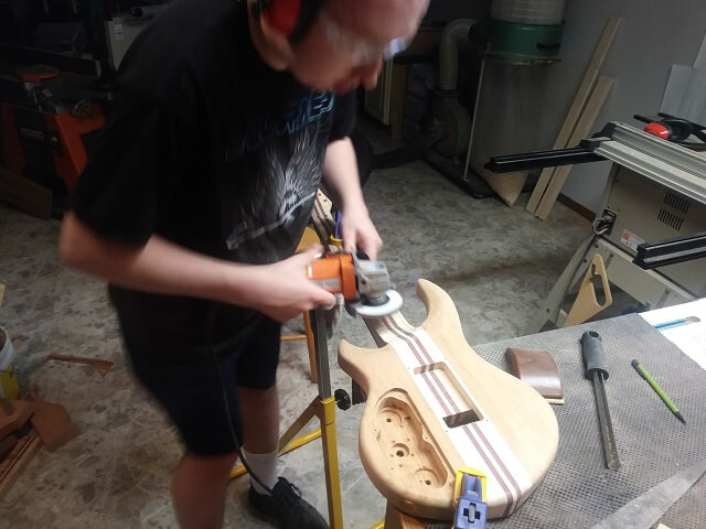 Rough carving the neck to body transition.