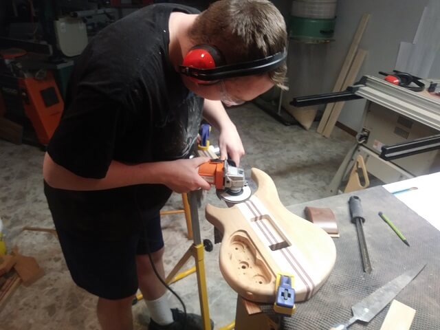 Rough carving the neck to body transition.