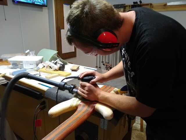 Sanding the back of the bass.