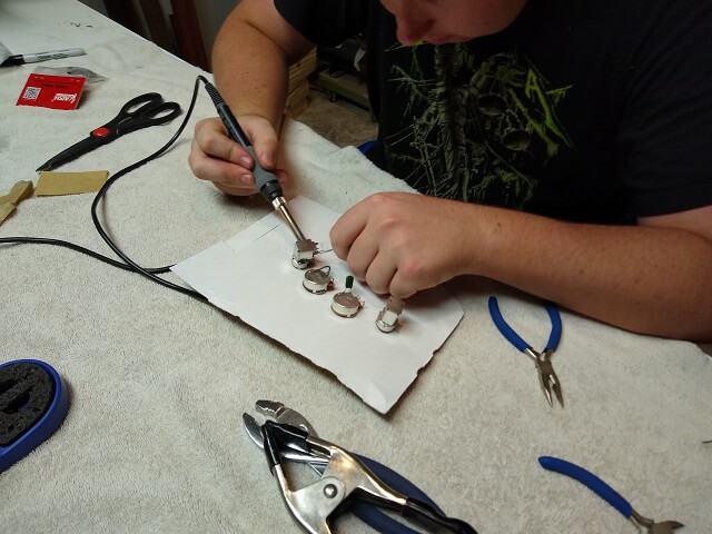 Wiring the electronics outside the control cavity.