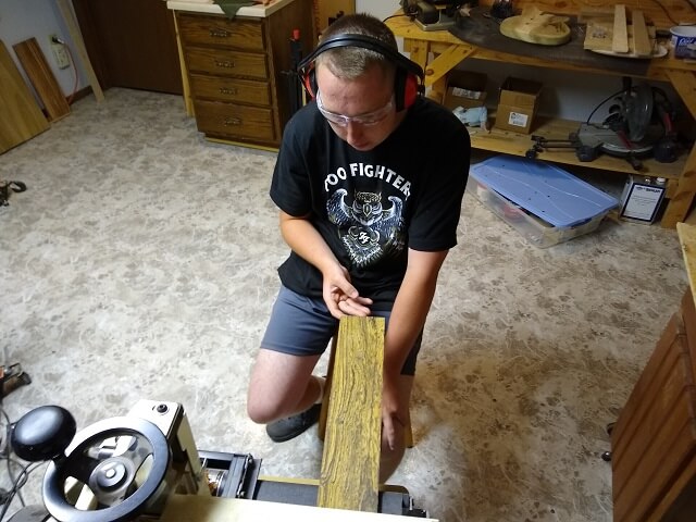 Sanding the fretboard blank flat.