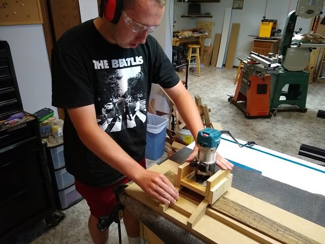 Radiusing the fretboard with the router jig.