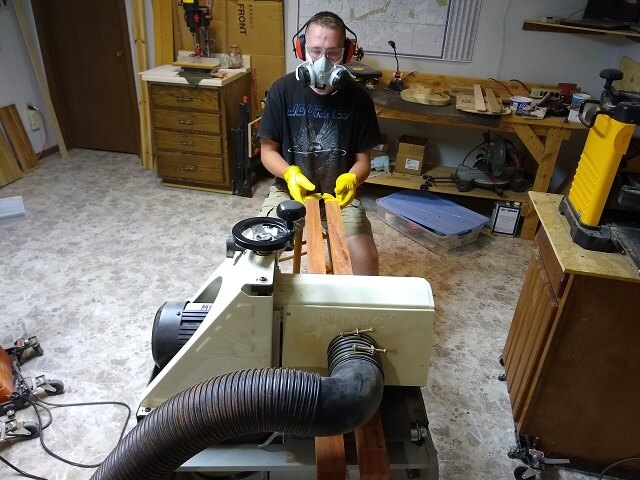 Sanding the band saw scratches off of the Padauk strips.