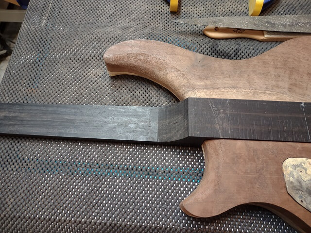 Test fitting the neck after the upper horn carve was done.