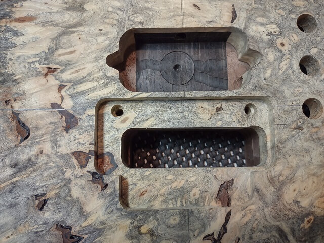 The finished post holes for the Floyd Rose bridge.