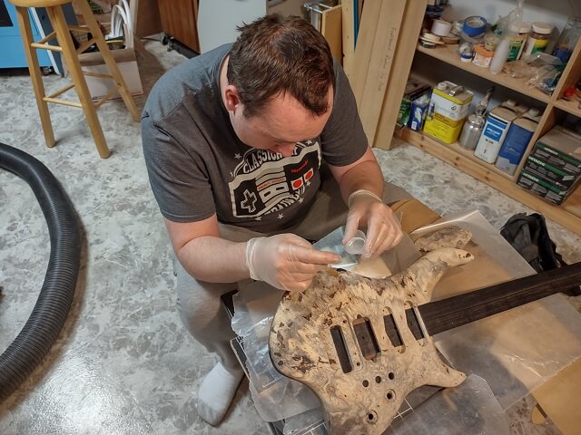 Filling holes in the buckeye burl.