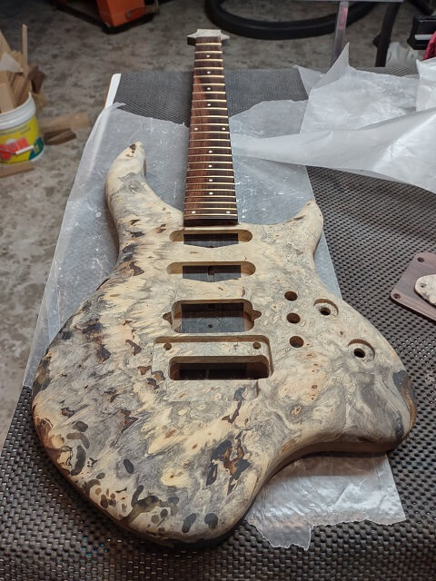The fretboard glued in place.