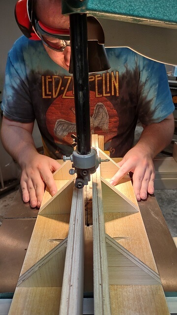 Resawing headstock veneer pieces from the buckeye burl.