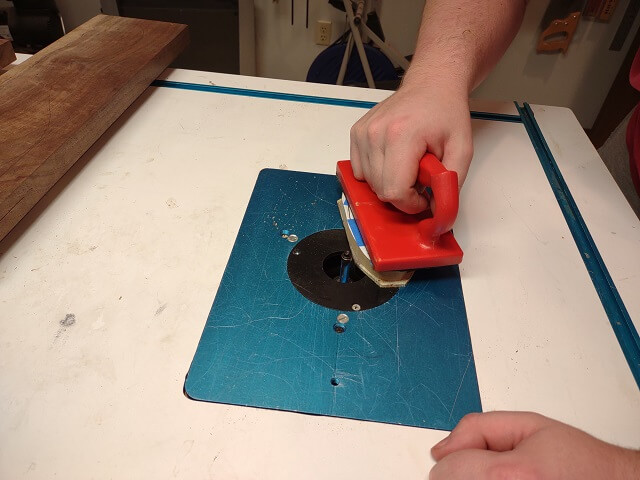 Routing the control cavity cover to shape.