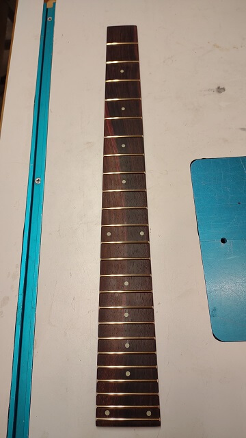 The completed fret board.