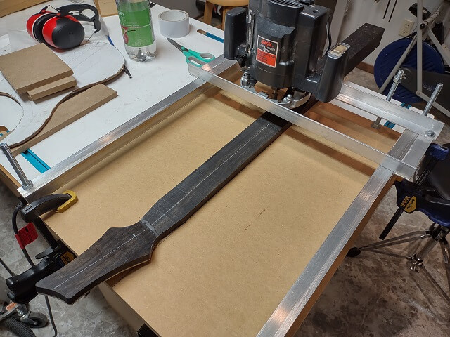 Using the router sled to bring the back of the neck to exact thickness.