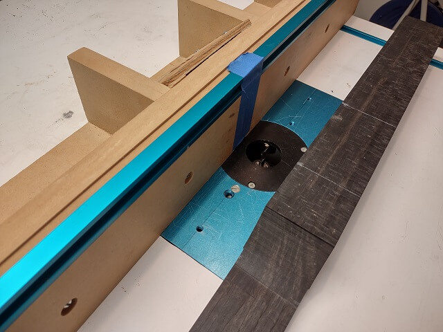 Setting up the router table for the wire channel route.