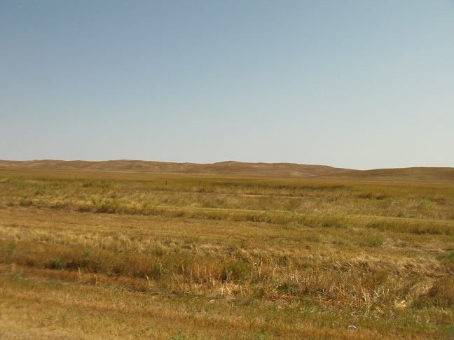 Barren ranch land, similar to what I would later find riding back through western SD.