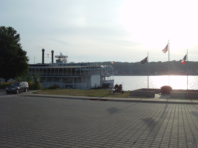 A riverboat alongside of the Mississippi.