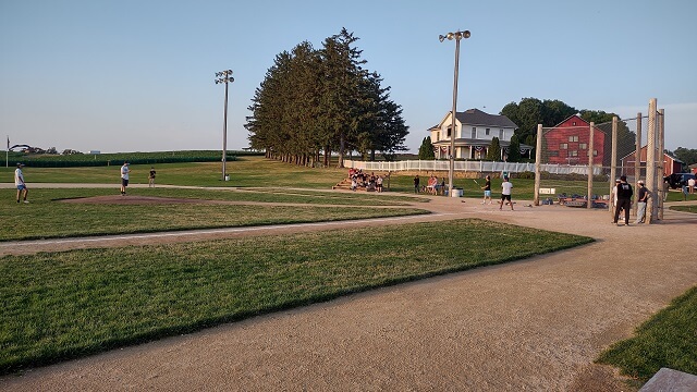 Watching a group play baseball at the Field of Dreams movie site in Dyersville, IA.