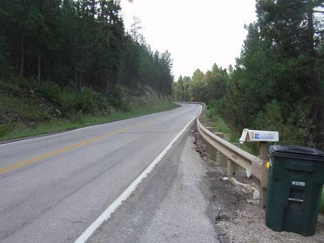 The highway and a garbage can.